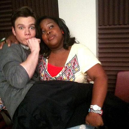 Picture of Chris Colfer and Amber Riley on the set of Glee.